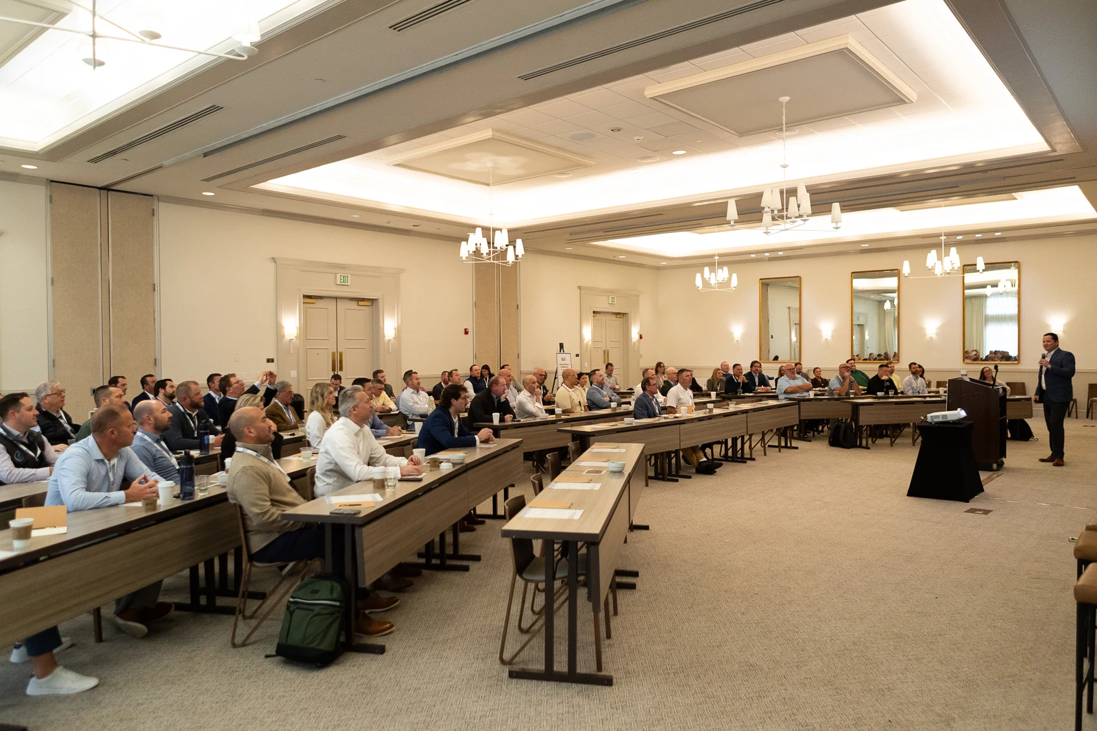 Advisors attending an in-person GVA event in a conference room